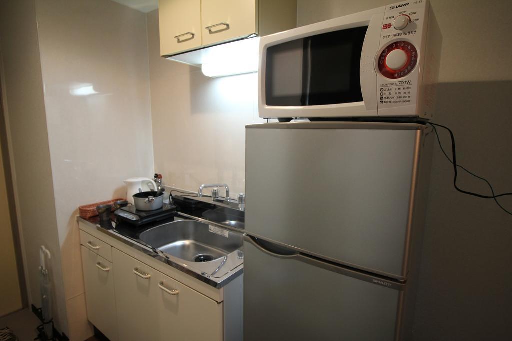 Ookini Hotels Karasuma Gojo Apartment Kioto Habitación foto